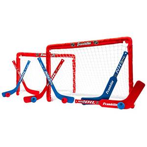 lot 194 image: Franklin Sports NHL Kids Mini Hockey Goal Set - (2) Mini  Knee Hockey Goals, (4) Youth Sticks, (2) Goalie Sticks  (4) Foam Balls - Knee  Mini Hockey Set