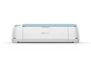 lot 14418 image: Cricut Maker in Blue & Digital Content Library Bundle - Smart Cutting Machine - Cuts 300 Materials, Home Decor & More, Bluetooth Connectivity, Compatible with iOS, Android, Windows & Mac