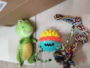 lot 2563 image: Set Of 3 Dog Toys - Dino, Ball, and Rope