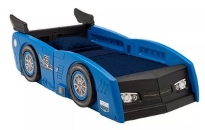 lot 2557 image: Delta Children Grand Prix ToddlerTwin Bed - Retail$299.99