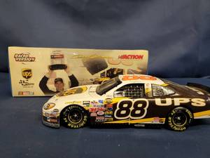 lot 14315 image: Dale Jarrett #88 UPS Daytona Shootout Win 2004 Ford Taurus Raced-Used Tire 4,188