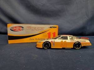 lot 14327 image: Cale Yarborough #11 The Victory Lap  3x Champion 2003 Monte Carlo Bank