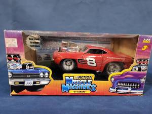 lot 14403 image: Muscle Machines USA NASCAR #20 Tony Stewart 1969 Camaro 124 Scale action usa