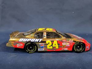 lot 14415 image: Jeff Gordon #24 DuPont 2002 Monte Carlo 24kt Gold Stock