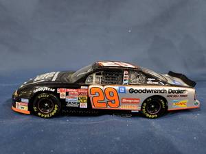 lot 14424 image: Kevin Harvick 2002 #29 GM Goodwrench Dealers Now Sell Tires Action Diecast 124