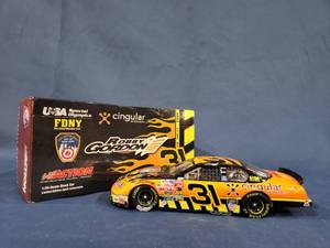 lot 14463 image: Action Robby Gordon #31 FDNY Cingular Monte Carlo 2003 124 Scale Nascar