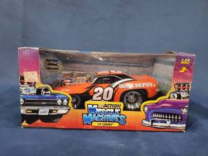 lot 14465 image: Muscle Machines USA NASCAR #20 Tony Stewart 1969 Camaro 124 Scale action usa