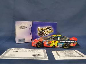 lot 14007 image: Autographed Jeff Gordon #24 DuPont  Daytona Raced Win Version 2005 Monte Carlo 1 of 3,504 PN 109882 124 Scale