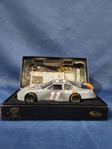 lot 14024 image: DENNY HAMLIN #11 FEDEX  TRACK TESTED 2007 MONTE CARLO SS OWNERS ELITE