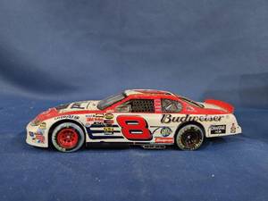 lot 14026 image: DALE EARNHARDT JR #8 BUDWEISER Born On Date 2004 Monte Carlo ACTION CLUB CAR 124 Scale
