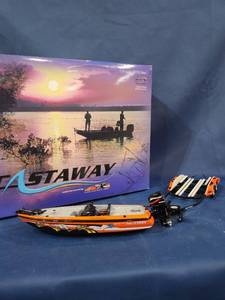 lot 14062 image: Dale Earnhardt Jr. #8 Looney Tunes Rematch 2002 Nitro Boat & Trailer Total Production of 3,320 PN 700035 124 Scale