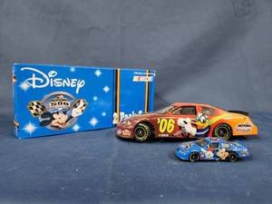 lot 14482 image: 2004 Nascar Disney Mickey Mouse Daytona 500 Twin Pack Cars 124 & 164 Scale