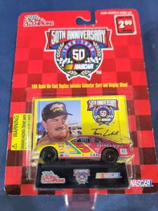 lot 14500 image: Racing Champions 164 scale diecast with collectible card 1997 edition #5 Terry Labonte