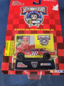 lot 14502 image: Racing Champions 164 scale diecast with collectible card 1997 edition #30 0