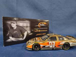 lot 14538 image: NASCAR Checkered Flag Sports 07 JR Motorsports Grand Opening Collectible 124 Scale