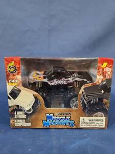 lot 14539 image: 2004 Tony Stewart 143rd SMOKE Monster Truck