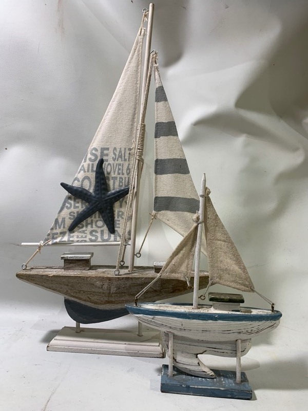 lot 229 image: 2 Decorative Wooden Nautical Baby Blue Cream Sail Boats 6 and 10