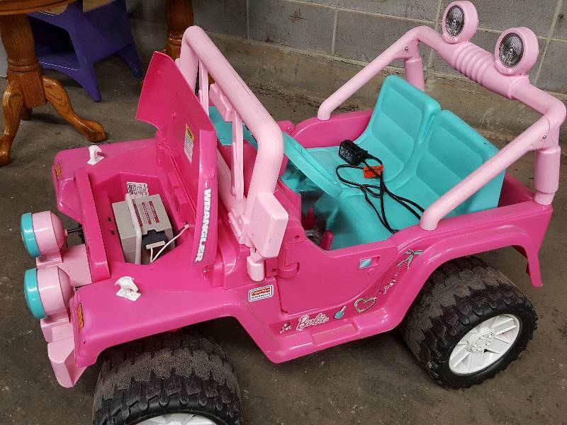 lot 2009 image: This is it Barbie kids.  Fully charged battery and includes the charger.  Very nice 2 passenger Jeep