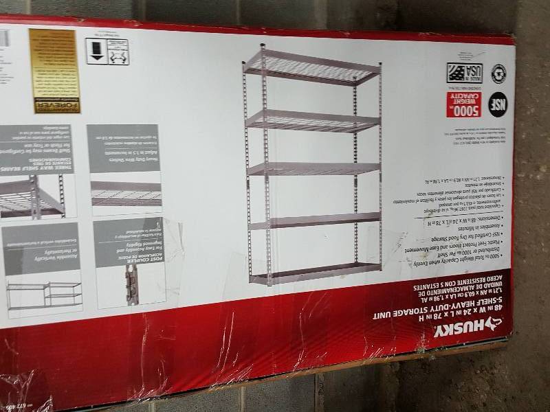 lot 2011 image: New in the box is this Husky brand 5,000 lbs 5 tier 48 tall shelf storage unit.