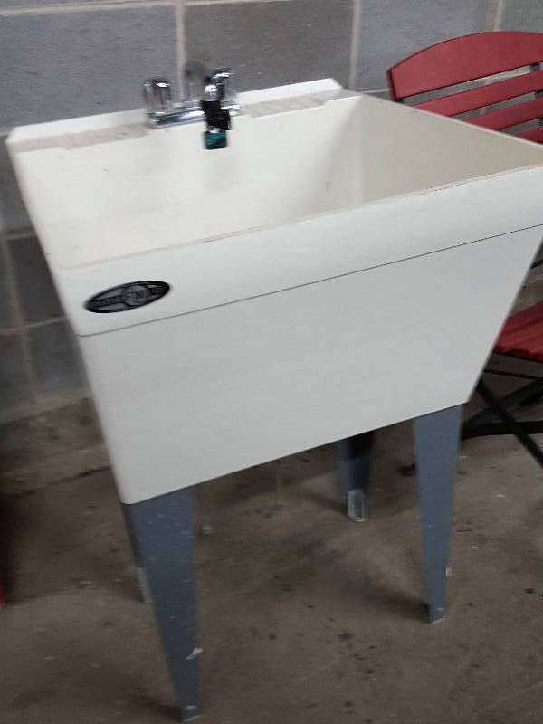 lot 2012 image: Utility room or shop deep sink with faucet and legs in excellent condition