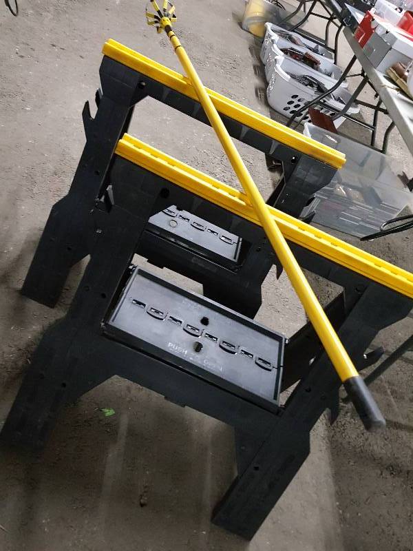 lot 2027 image: Pair of handy fold up fold out plastic saw horses and the big bonus