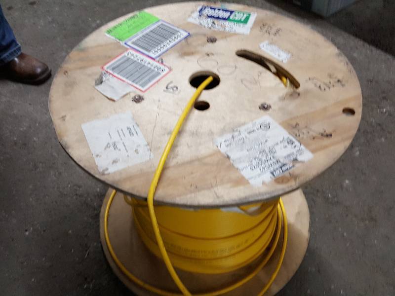 lot 2032 image: Big spool of Optical Fiber cable.  Started with 1500 feet and not sure how much has been used.