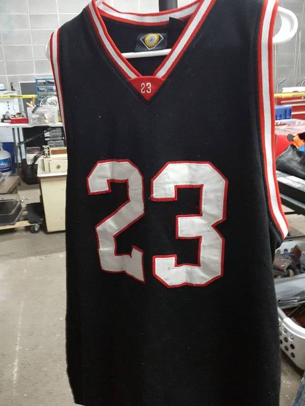 lot 2038 image: OK Collectors, this is the real deal Michael Jordons #23 Basketball Classic size 56 jersey