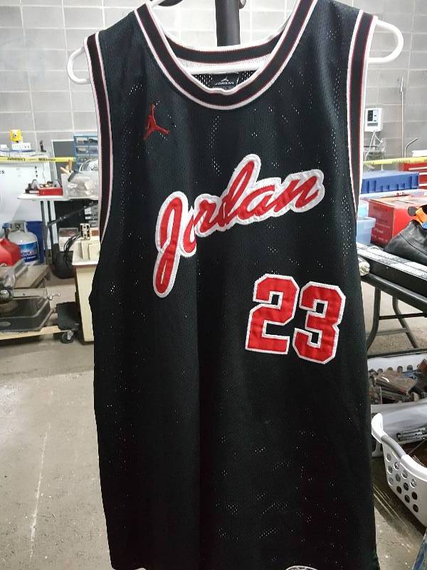 lot 2039 image: OK Collectors, this is the real deal Michael Jordons #23 Air Jordan size XXL jersey
