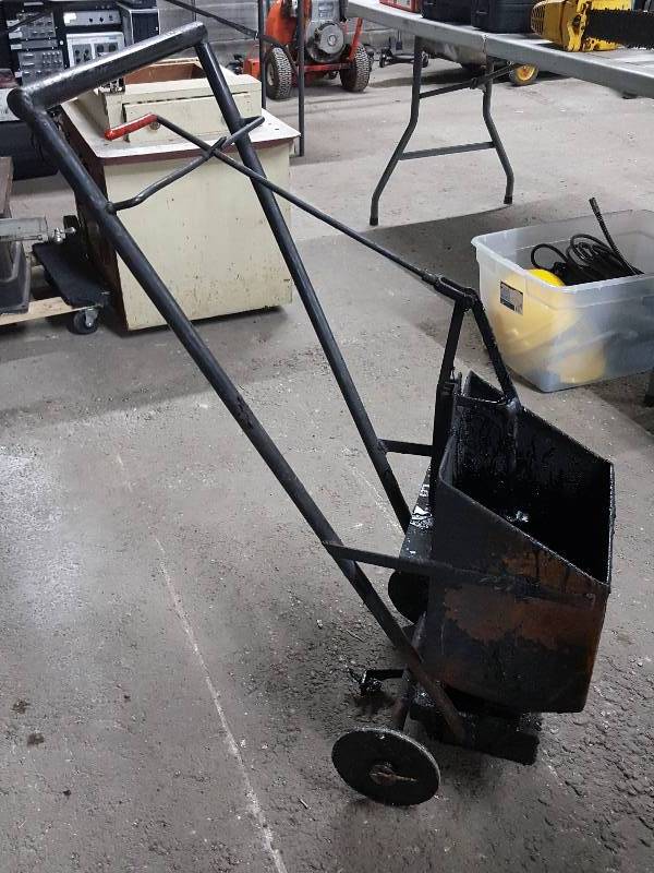lot 2041 image: Ready to go to work for you is the Roofer tar buggy.  Warm it up and it might even have some tar left to use
