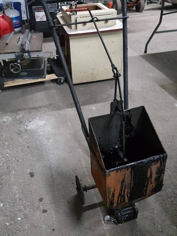 lot 2042 image: Ready to go to work for you is the Roofer tar buggy.  Warm it up and it might even have some tar left to use