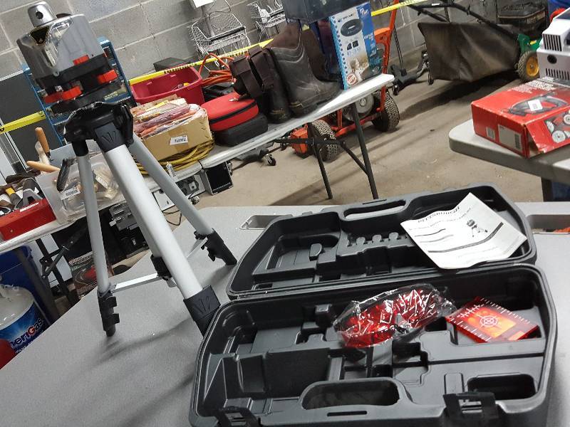 lot 2053 image: Total package Pittsburg Laser level kit with Tri Pod and storage carrying case too.  Powers up and works great