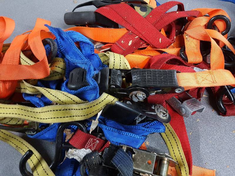 lot 2074 image: Full bag of cargo and motorcycle tie downs with ratchets.  Save a bunch with over a dozen sets