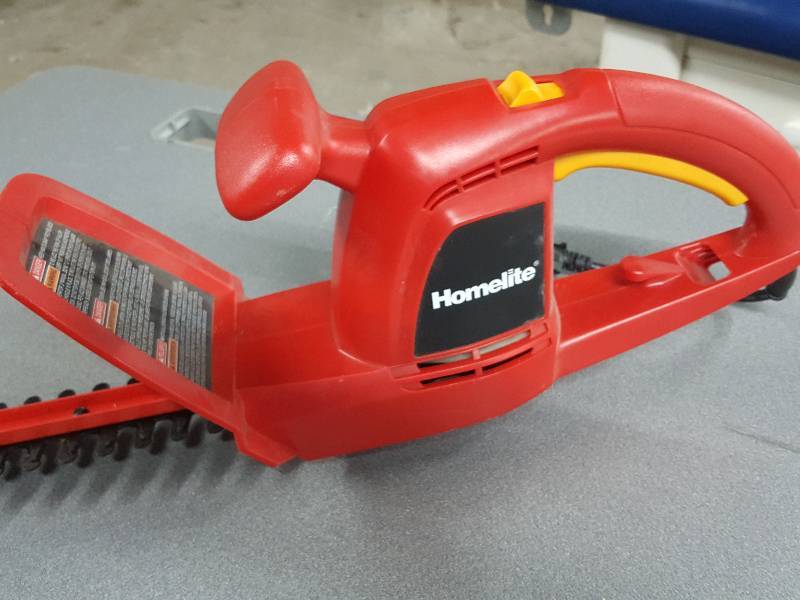 lot 2079 image: In excellent condition is this Homelite electric hedge trimmer