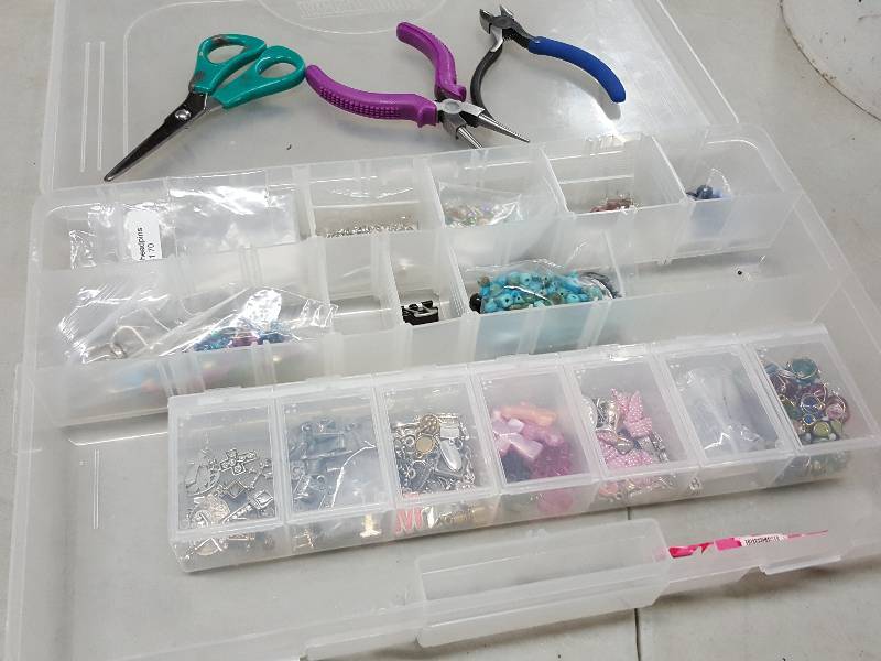 lot 2091 image: Box with special tools for working with beads and charms for necklaces and bracelets.