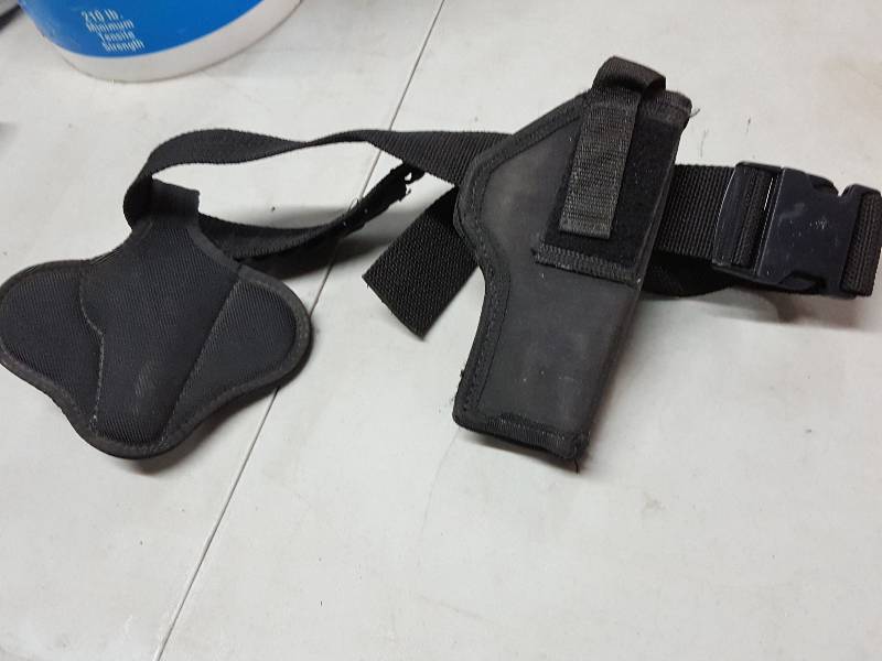 lot 2093 image: Adjustable Pistol holster and belt with holders for the ammo.  Not sure what the other holder is for.