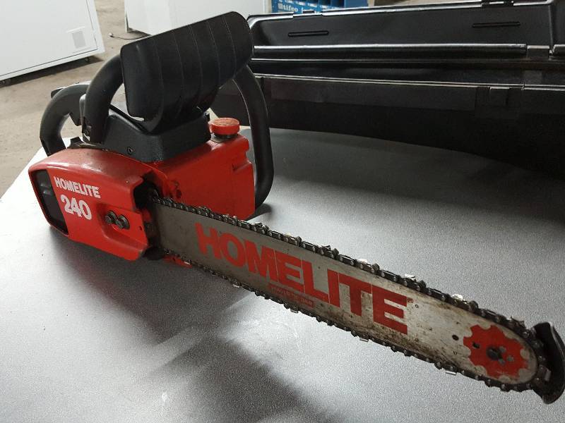 Homelite model 240 chain saw with good compression and storage case
