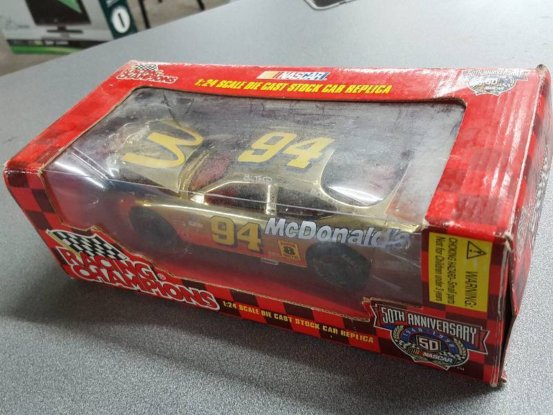lot 2134 image: New in the box #94 Bill Elliott NASCAR 124 scale box is a little humble