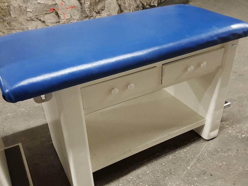 lot 2165 image: Blue vinyl padded top doctors examination or what ever you feel like doing 54 X 24 X 33 tall long table