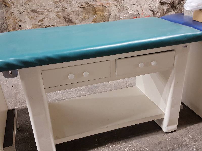 lot 2166 image: Green vinyl padded top doctors examination or what ever you feel like doing 54 X 24 X 33 tall long table