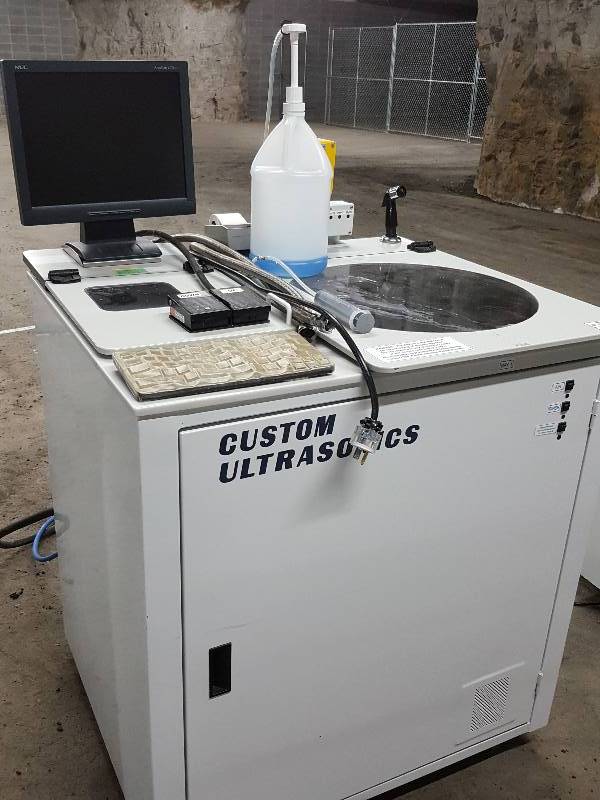 lot 2173 image: If you want to get your instrument(s) clean, this Custom Ultrasonics washing and sterilizing machine will get that job done.