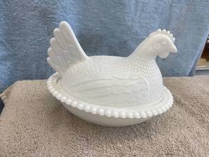 lot 5554 image: white hen on a nest