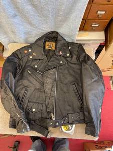 lot 5585 image: leather coat Cannot read size - think it is a medium