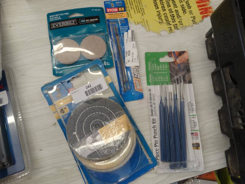 lot 242 image: Buffing & Polishing Wheels,Scroll Saw Blodes, Heavy Duty Felt Pads, & Pin Punch Kit.