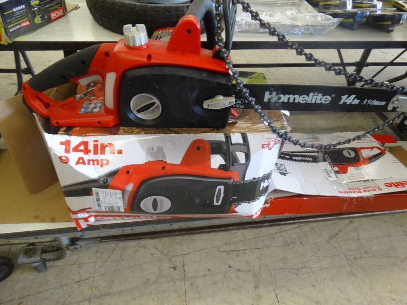 lot 269 image: Homelite 9 Amp Electric Chainsaw.