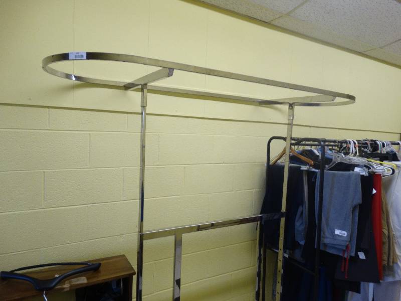 lot 353 image: Metal Clothes Rack On Wheels.