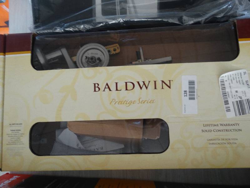 lot 128 image: Baldwin Prestige Series Door Knob & Dead Bolt.