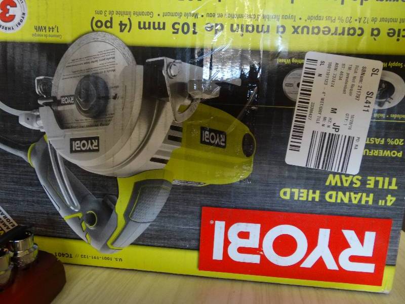 lot 162 image: Ryobi 4 Hand Held Tile Saw.