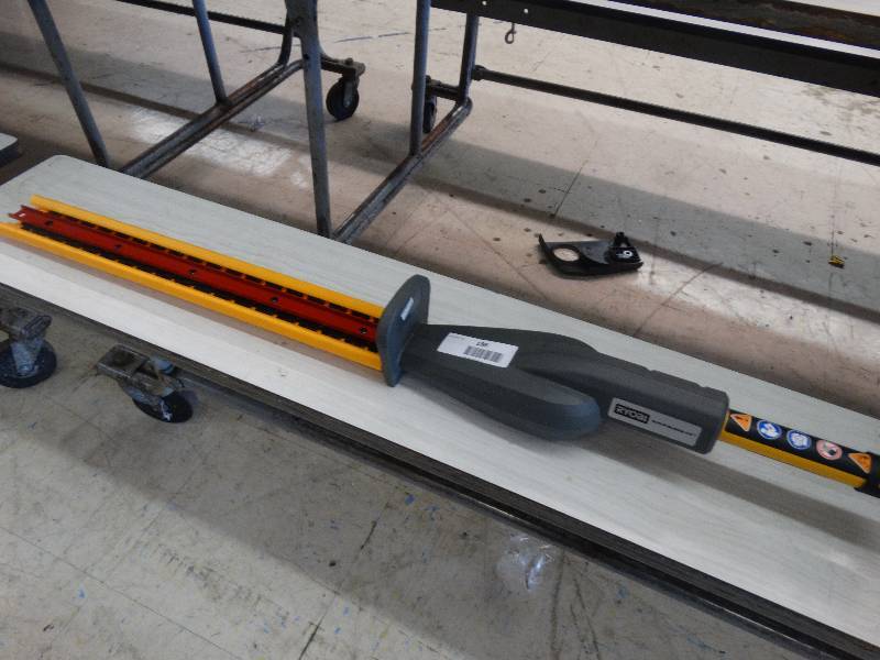 lot 186 image: Ryobi Expand-it Hedger Attachment.