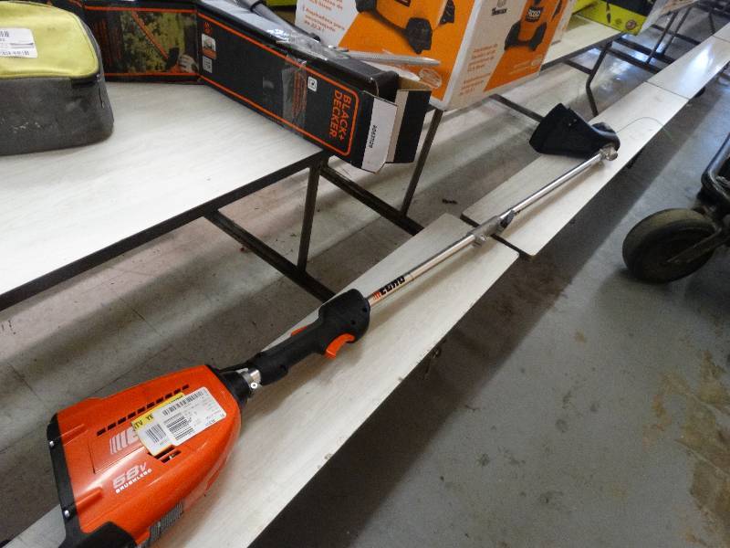 lot 223 image: Echo 58v Brush less Weed Eater Battery Missing.
