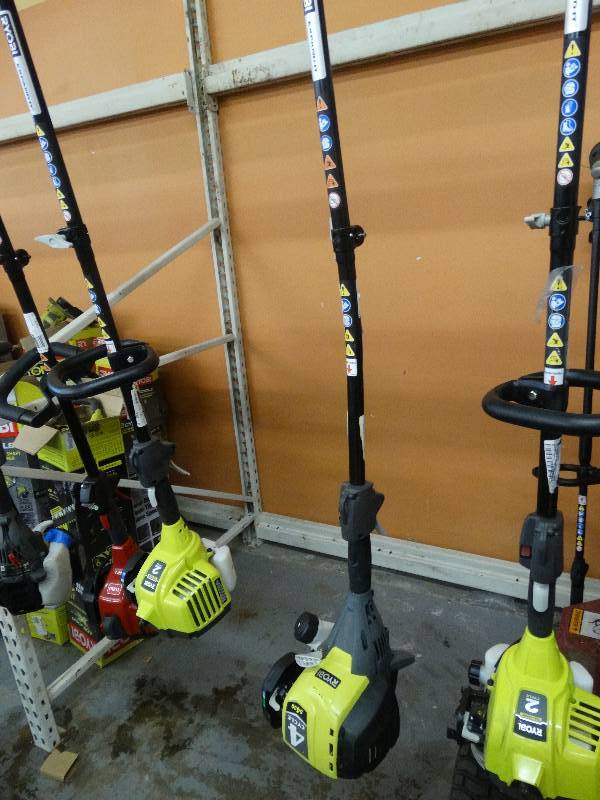 lot 228 image: Ryobi 4 Cycle 12000 RPM Gas Weed Eater.